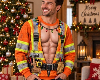 May include: An orange long-sleeve sweatshirt featuring a printed graphic of a high-visibility construction vest with reflective stripes, a tool belt with a hammer and tape measure, and a string of colorful Christmas lights around the neckline.