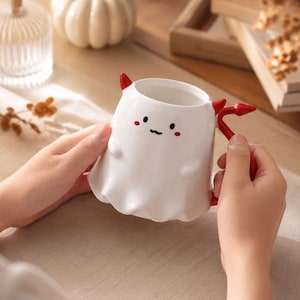Cute Devil Mug with Trident Stirrer, 16.9 oz Ceramic Halloween Coffee Cup, Red Tail Handle, Spooky Gift for Her or Friend