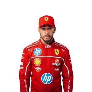 May include: A bright red racing jacket featuring the Ferrari logo, HP, Shell, UniCredit, VGW Play, Ceva, and IBM branding. The jacket includes a matching red baseball cap with the Ferrari emblem, all worn by a person with a short beard.