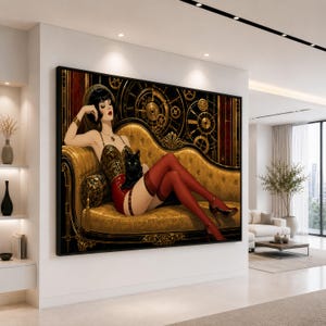 May include: A framed wall art print depicting a person with short black hair reclining on a gold-colored ornate sofa. The person wears a gold corset, red stockings, and high heels, holding a black cat. The background features gold clockwork gears.