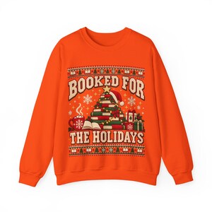Kersttrui met boekenthema, 'Boeken voor de feestdagen', print van een boekenboom.