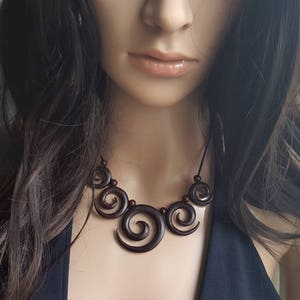 Ethno leather necklace with spirals, necklace with five wooden spirals, leather strap necklace, ethno jewellery for women