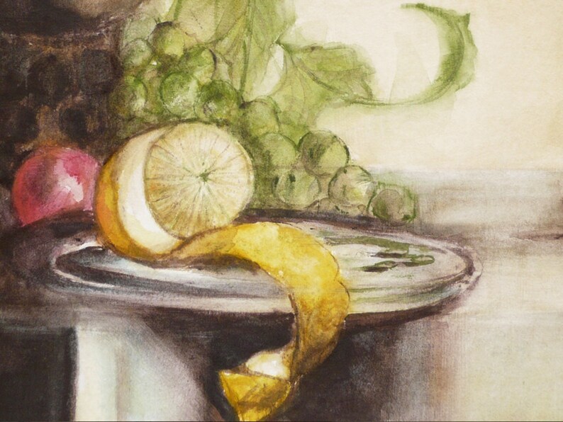 May include: A watercolor painting of a still life with a lemon, grapes, and a pink apple on a plate. The lemon is peeled and the peel is curled up on the plate. The grapes are green and the apple is pink.