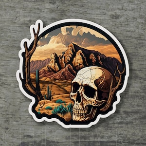 Puede incluir: Una calavera blanca con una superficie agrietada se encuentra en un paisaje desértico con una cordillera de montañas en el fondo. La escena está rodeada por un círculo blanco con un contorno negro.