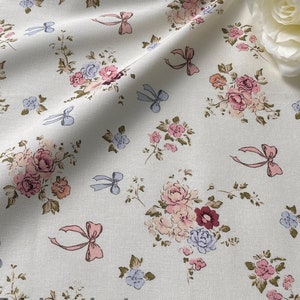 Little Floral Bows  On Cream Cotton fabric - A half yard