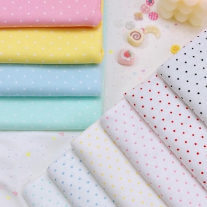 Puede incluir: Telas de colores pastel con lunares blancos: rosa, amarillo, azul y verde. Telas adicionales con lunares rojos, rosas y negros. Ideal para proyectos de costura y manualidades.