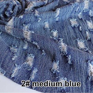 May include: Close-up of a medium blue denim fabric with distressed holes and frayed edges. The fabric is textured and has a worn look. The text "2# medium blue" is visible in the bottom right corner of the image.
