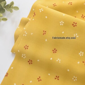 Tiny Sakura Flower  On Ginger Yellow Cotton Fabric - 1/2 Yard