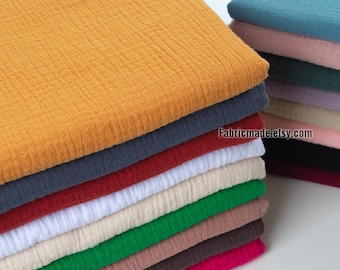 Puede incluir: Una pila de 14 cuadrados de tela de algodón de diferentes colores. El cuadrado superior es de color amarillo mostaza. La tela tiene una textura de tejido de gofre. El texto "Fabricmade.etsy.com" es visible en la esquina inferior derecha de la imagen.