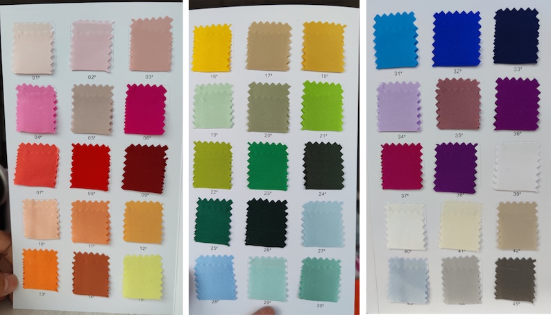 May include: A color chart with 50 fabric swatches, each labeled with a number. The swatches are arranged in rows of five, with each row featuring a different color scheme. The colors range from light to dark, and include shades of pink, red, orange, yellow, green, blue, purple, and brown.