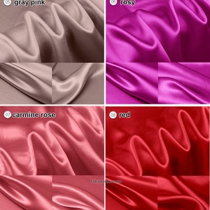 May include: Four swatches of satin fabric in different shades of pink and red. The swatches are labeled with numbers and color names: 05 gray pink, 06 rosy, 07 carmine rose, and 08 red.