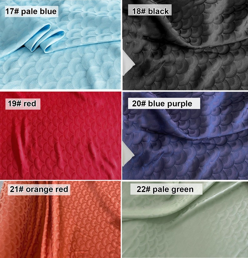 May include: Six fabric swatches with a scale pattern. The swatches are in the following colors: pale blue, black, red, blue purple, orange red, and pale green.