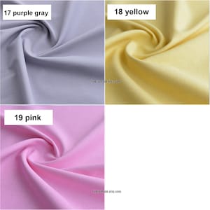 May include: Three fabric swatches in different colors: purple gray, yellow, and pink. The swatches are arranged in a grid pattern. The text "17 purple gray", "18 yellow", and "19 pink" is printed above each swatch.