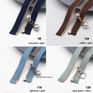 May include: Four different zipper pulls with different colors and finishes. The zipper pulls are all gold, but the fabric colors are navy blue, brown, light blue, and aqua green. The zipper pulls are labeled with numbers 9, 10, 11, and 12. The text below each zipper pull describes the color of the fabric and the finish of the zipper pull.