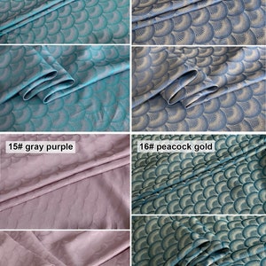 May include: Four fabric swatches with a repeating pattern of overlapping semi-circles. The swatches are labeled 13# blue, 14# blue gold, 15# gray purple, and 16# peacock gold.