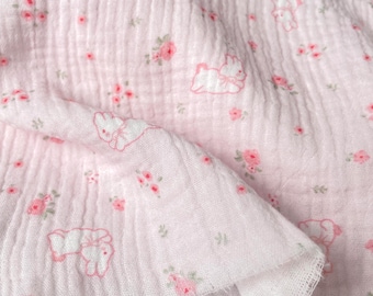 Muselina de algodón de doble gasa rosa con estampado de conejos y flores, 0,5 metros