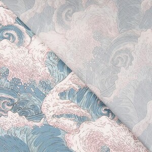 May include: A fabric with a repeating pattern of stylized ocean waves. The design features swirling blue water with white and pink foam, reminiscent of a classic Japanese woodblock print. The fabric is folded, revealing the pattern.