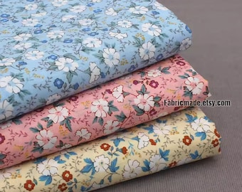 Little White Flower Cotton Fabric On Blue Pink Yellow Cotton - 1/2 Yard