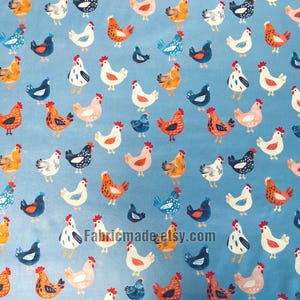 May include: A light blue fabric featuring a repeating pattern of chickens in various colors including white, orange, and dark blue. The chickens are depicted in different poses across the surface. The text Fabricmade.etsy.com is visible.