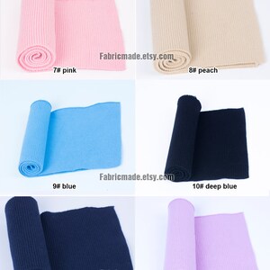 Op de afbeelding: Zes rollen geribbelde brei in verschillende kleuren, waaronder roze, perzik, blauw, donkerblauw, marineblauw en lila. De stof is opgerold en de uiteinden zijn zichtbaar. De tekst "Fabricmade.etsy.com" is zichtbaar op de afbeelding.