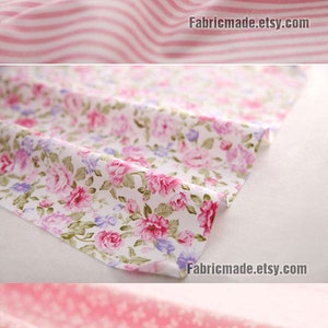 May include: Three different pink fabric swatches with various patterns. The first swatch is a pink and white striped fabric. The second swatch is a white fabric with a pink floral pattern. The third swatch is a pink fabric with a white bow pattern. Fabricmade.etsy.com is printed on each swatch.