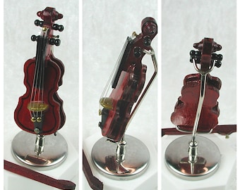 Musical instruments for the dollhouse, banjo, guitar, electric guitar, accordion, keyboard, violin