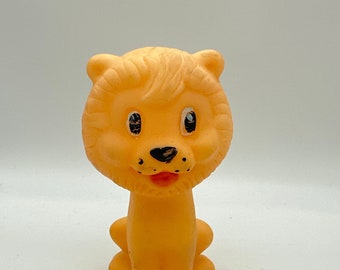 Vintage rubber lion squeak toy