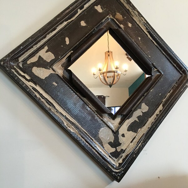Antique distressed dirty white and metal colored tin ceiling tile mirror