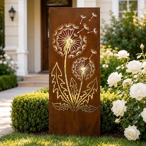 May include: A tall, rectangular, rust-colored metal garden screen featuring a laser-cut design of two dandelion flower heads with stems, leaves, and seeds blowing in the wind. The cutout pattern reveals a bright, reflective metallic finish.