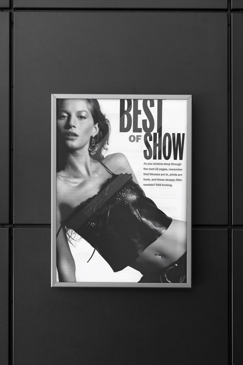 May include: A black and white framed poster featuring a person wearing a dark, sleeveless top with thin straps and decorative cutouts. The text reads: BEST OF SHOW. As you window-shop through the next 12 pages, remember that blouses are in, prints are back, and those strappy little sandals? Still kicking.