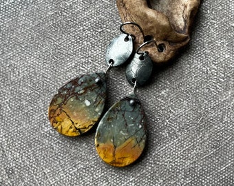 stone and textured metal earrings by AnvilArtifacts, Snowfall Over the Mountains, Fireflies at Twilight,