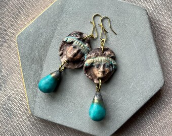 relic style artisan face earrings with ceramic turquoise and bronze drops by AnvilArtifacts