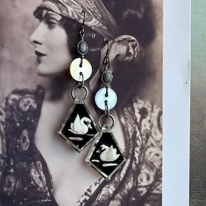 reverse carved vintage swan earrings with mother of pearl buttons by AnvilArtifacts, assemblage