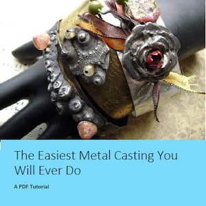 May include: A close-up of a metal casting tutorial, featuring a silver bracelet with a rose and other embellishments. The title of the tutorial is "The Easiest Metal Casting You Will Ever Do."