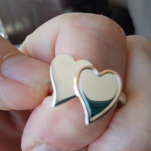 Bague Clogau Cwtch double cœur. Tailles disponibles : M, N, P. Neuve dans son emballage d'origine.