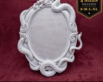 May include: A light gray oval frame featuring a sculpted dragon wrapping around the perimeter. The center contains a grid of small circular perforations. Text in the upper right corner reads 4 SIZES INCLUDED S M L XL, and text at the bottom reads STL DOWNLOAD.