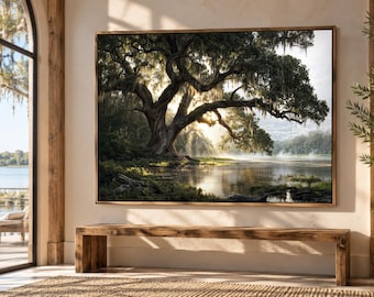 May include: A large rectangular wall art piece featuring a landscape photograph of a sprawling oak tree with hanging moss beside a calm river. The scene captures golden sunlight filtering through the branches, creating light rays over the water.