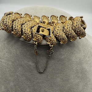 Vintage Monet Gold Tone Articulated Bracelet with Safety Chain, Textured Chain Link
