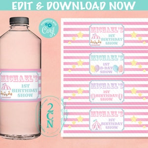 May include: Printable water bottle labels with a pink and white striped background. The labels feature a circus theme with a carousel, balloons, and a tent. The text on the labels reads "Michael's 1st Birthday Show".