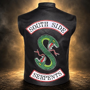 May include: A black leather vest featuring a large embroidered patch on the back. The patch displays a green snake coiled into the shape of the letter S, flanked by two white banners with red borders containing the black text SOUTH SIDE and SERPENTS.