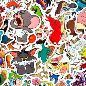 May include: A collection of assorted vinyl stickers featuring various colorful cartoon characters including Jerry the mouse, Tom the cat, Cow and Chicken, Spongebob Squarepants, and other animated figures with distinct outlines and vibrant colors.