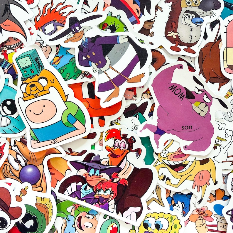 May include: A collection of assorted vinyl stickers featuring various colorful cartoon characters from animated television series, including Darkwing Duck, Finn and Jake, Courage the Cowardly Dog with a tattoo, and SpongeBob SquarePants.