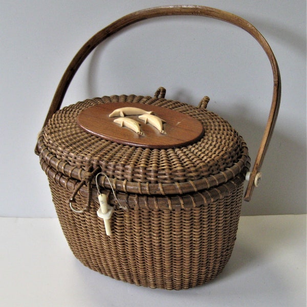 Vintage Farnum Nantucket basket purse, 8 1/2 x 6 1/2, Dolphin and sea gull embellishments, 2 porpoise scrimshaws, wicker signed bucket purse