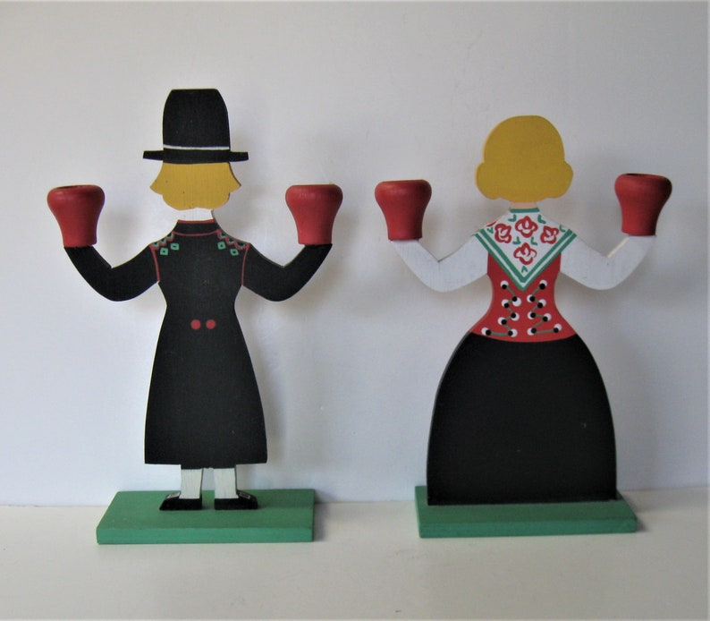 Hemslojden Boras 10 12 tall Pair of Swedish hand painted wooden candlestick holders Folk Art Bavarian man and woman figures gift