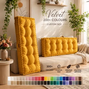 May include: Two rectangular mustard yellow velvet floor cushions with tufted button detailing and piped edges. The text reads Velvet 200+ COLOURS CUSTOM SIZE, with icons for 200+ COLOURS, CUSTOM SIZE, PREMIUM VELVET, and MULTIPLE OPTIONS.