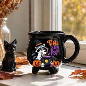 Time to Stir the Pot Raccoon Cauldron Mug - Black Ceramic Coffee Cup with Feet, Cute Halloween Witch Raccoon Pumpkin Design Drinkware Gift