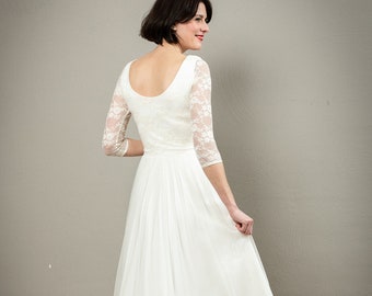 Simple long wedding dress with back cut and fine lace