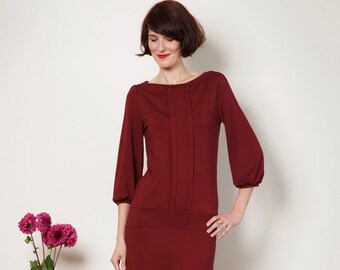 Rode heupjurk met elegante plooien en onderzeese schommel - Melody