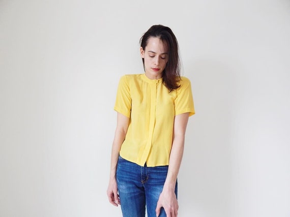 canary yellow blouse