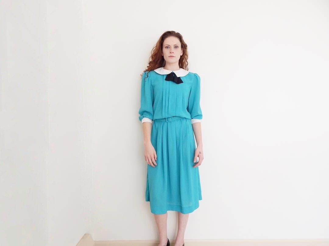 navy dress with white collar